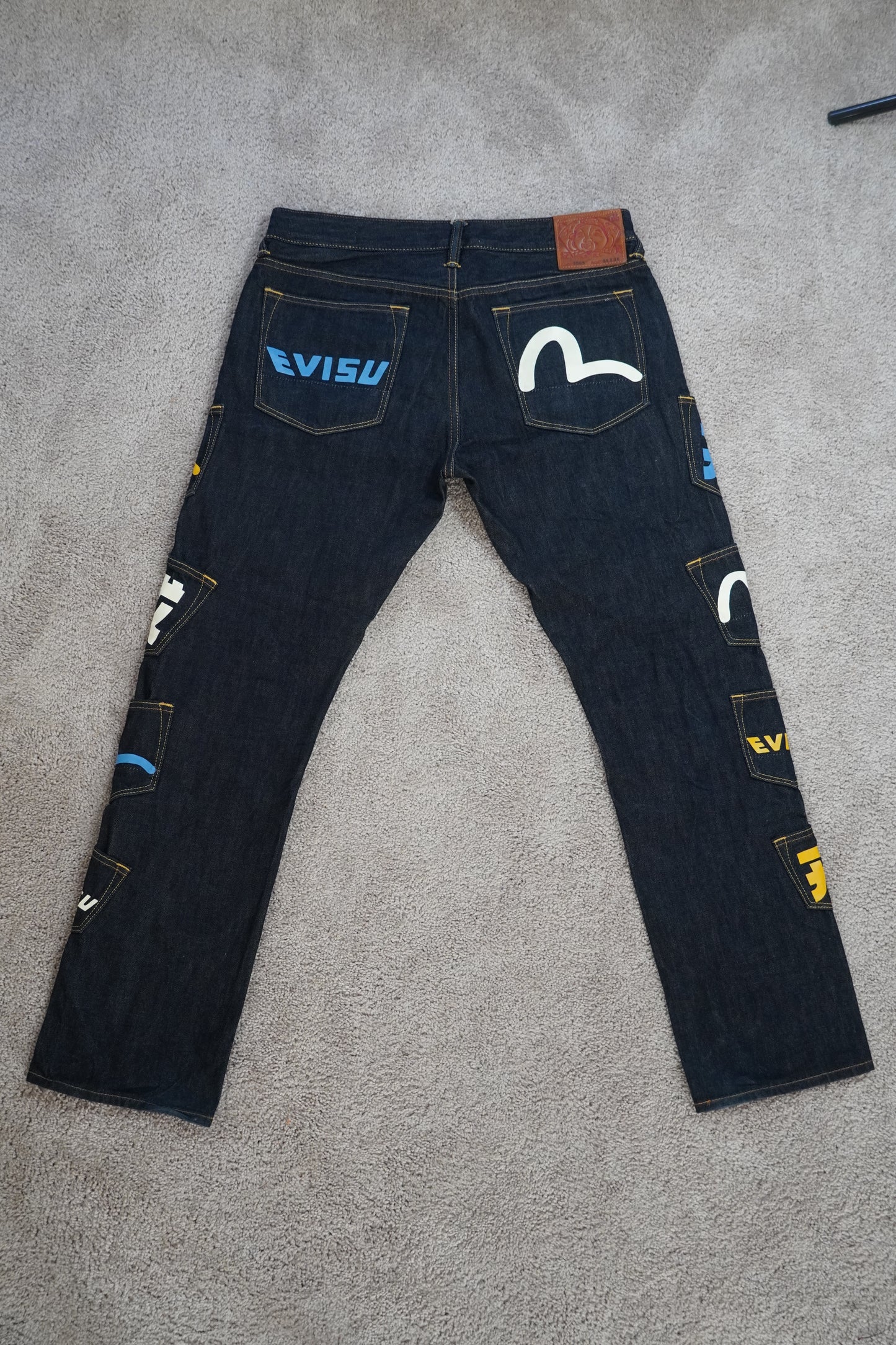 Evisu Logo-Print Multi-Pockets Regular-Fit Denim Jeans
